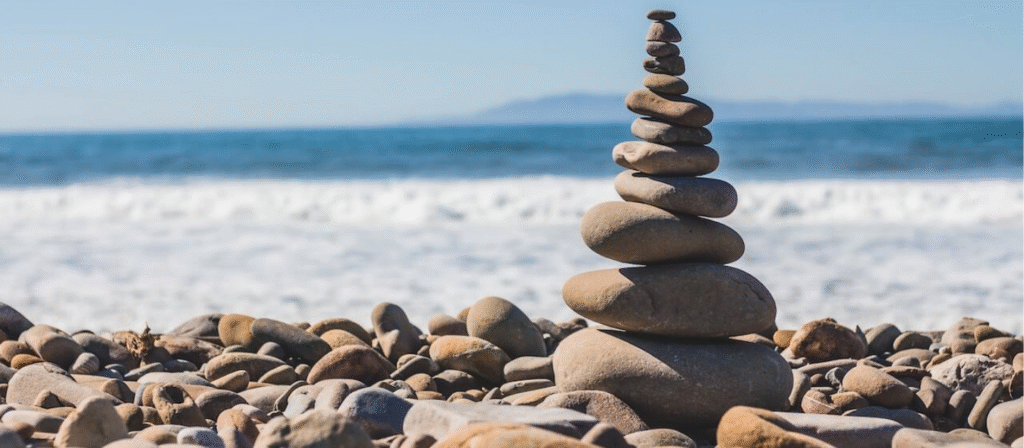 Restore Hyper Wellness Review: Is It Worth the Hype? 3 a stack of rocks on a beach for wellness